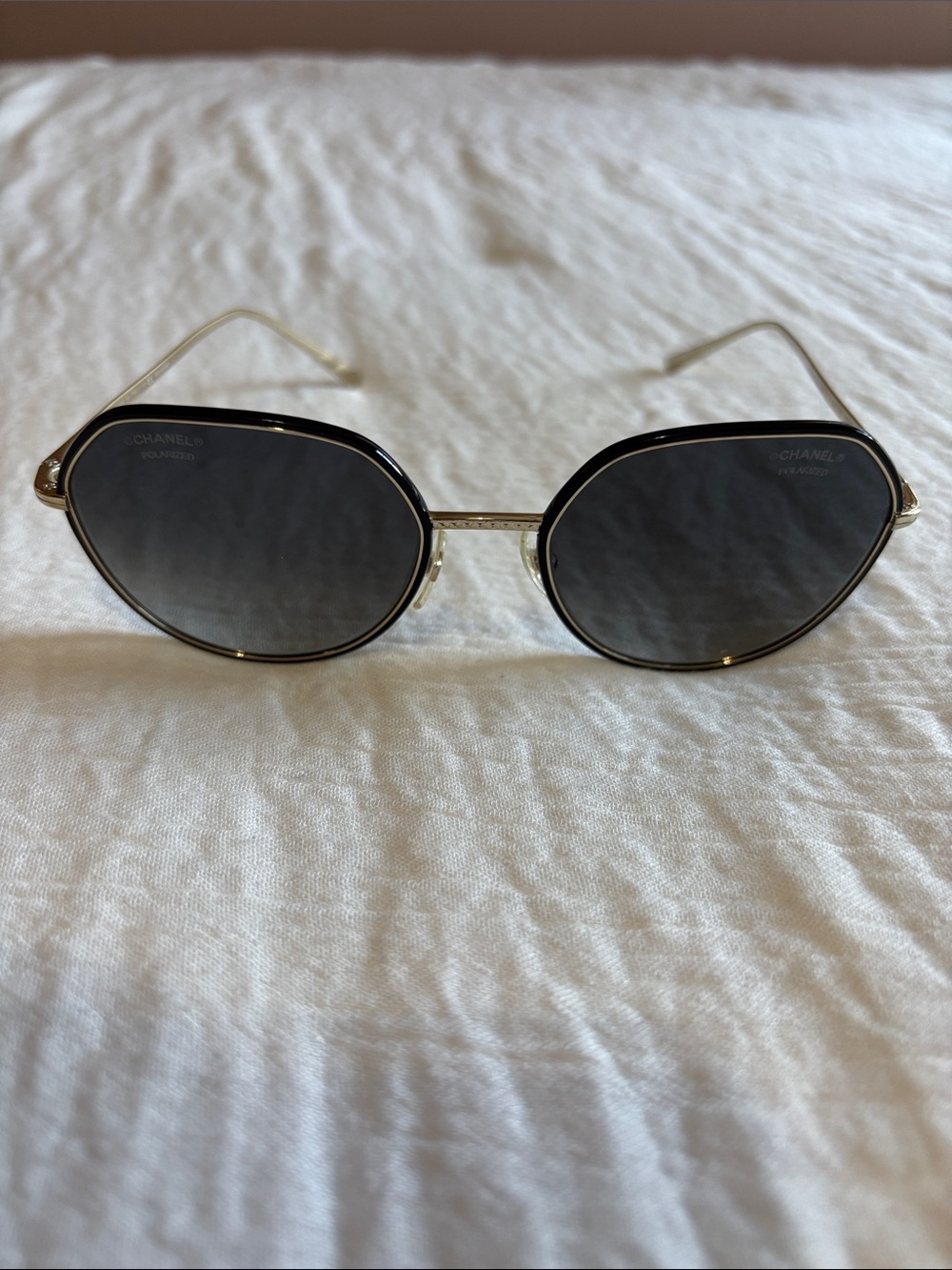 CHANEL Black and Gold Round Sunglasses